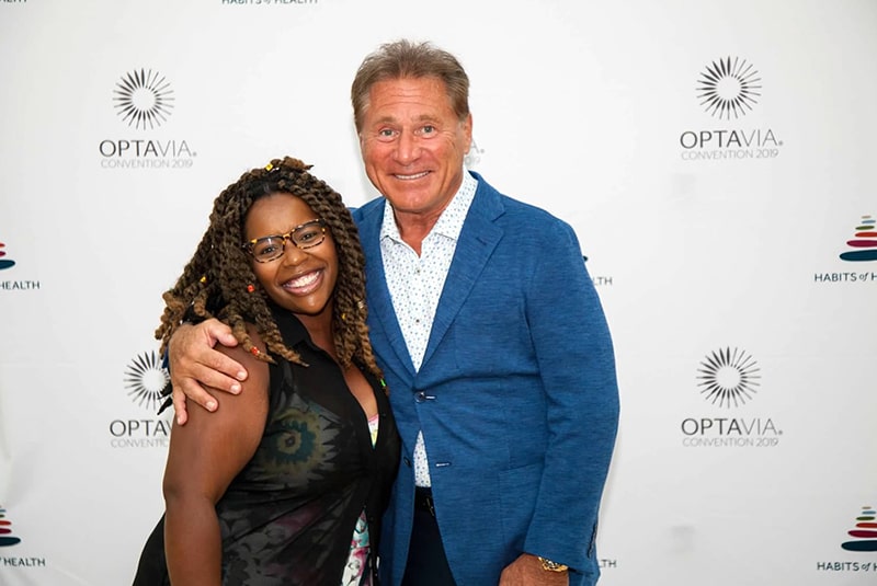 Dr. A and a guest posing for the camera.